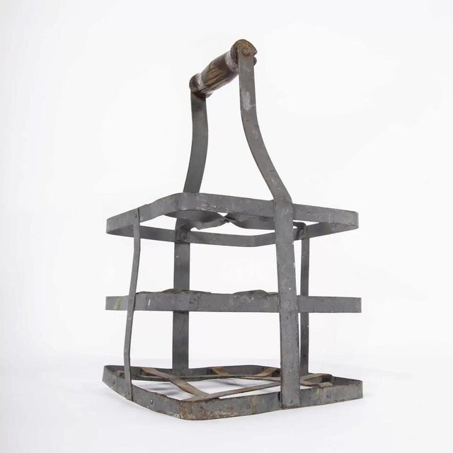1950’s Bottle Carrier – Four Bottles. Galvanised strap bottle carrier, with turned wood handle. Excellent condition....