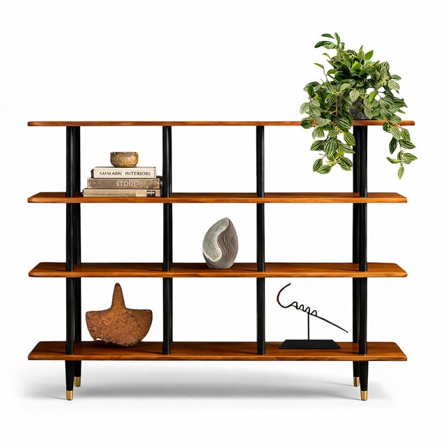 A refined example of Brazilian modernist restraint, this 1950s bookshelf by Móveis Valério pairs architectural clarity...