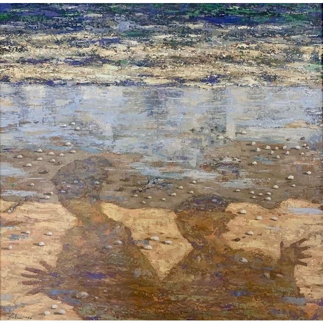 Long shadows fall across a sun-baked shore, stretching toward the water with the certainty that only late-afternoon light...