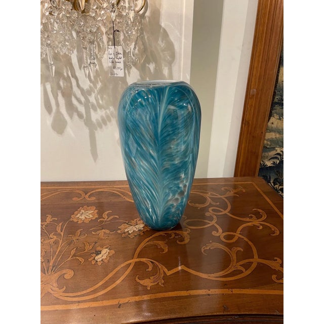 Decorative vintage blue Murano glass vase with a beautiful swirling pattern. A fabulous accessory that would make a great...