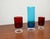Blue glass is probably a different manufacturer This piece has an attribution mark, I am sure that it is completely...