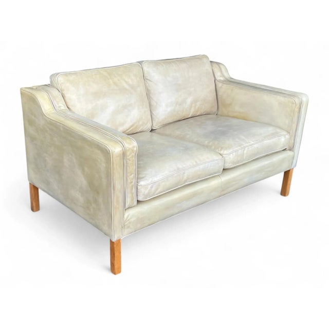 This exceptional Danish Modern loveseat, crafted in the style of Børge Mogensen, beautifully embodies the timeless...