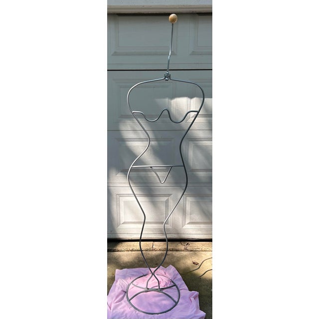 Vintage IKEA 1980s wire valet designed by Laurids Lonborg. Mannequin like female body form made in gray bent metal with a...
