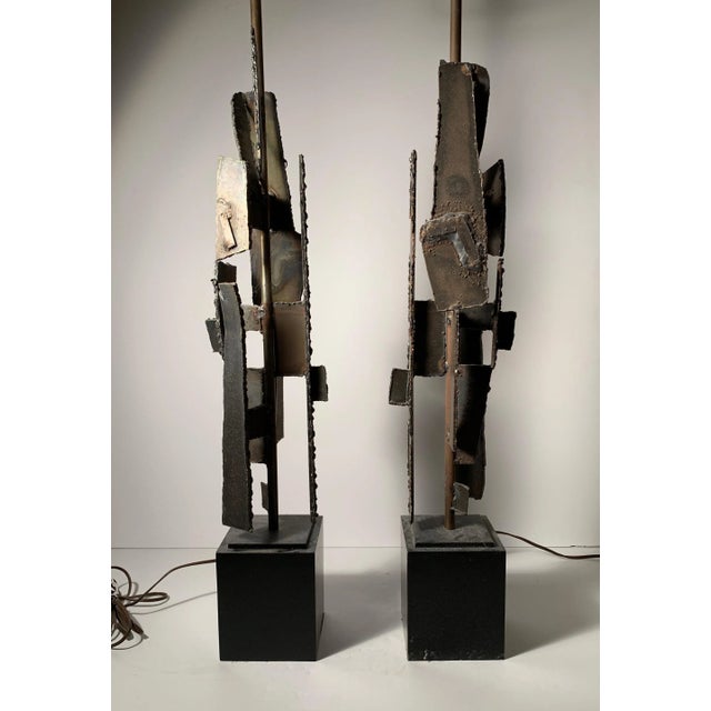 Pair of sculptural lamps by Richard Barr for Laurel lamp Co. Torch cut and Welded Brutalist design Sculptural iron in...