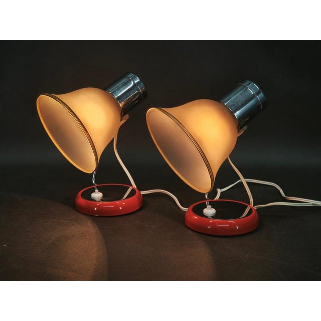 A striking pair of original mid-century modern table lamps by drupol, manufactured in czechoslovakia during the 1960s. The...