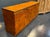 Nice quality MCM design burlwood and brass credenza after Pierre Cardin. Mid‑century burlwood credenzas with brass...