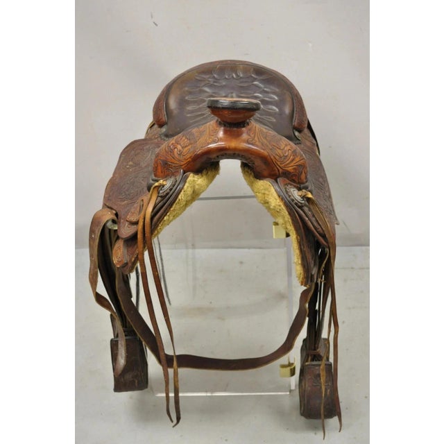 Vintage ML Leddy's Brown Tooled Leather Western Show Horse Saddle. Item features full tooled leather floral detail,...
