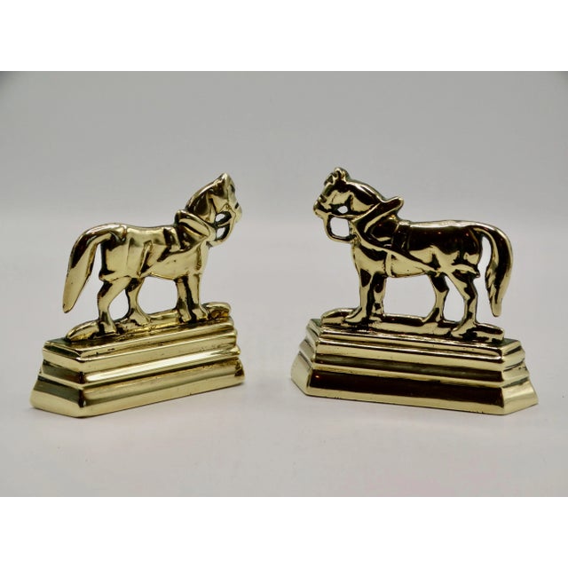 Lovely circa 1890 pair of English bright gilt brass shire horse mantle decorations. They retain their original lustrous...