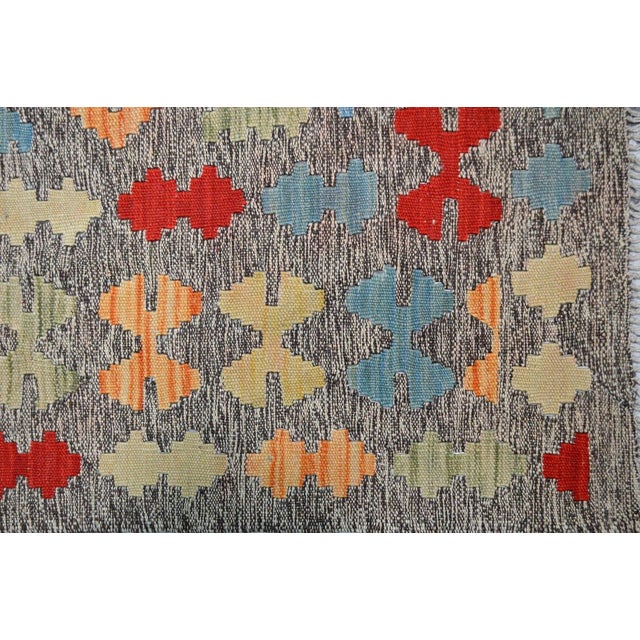 Flatweaved with care using traditional rug-making techniques, this wool rug blends timeless craftsmanship with a modern...