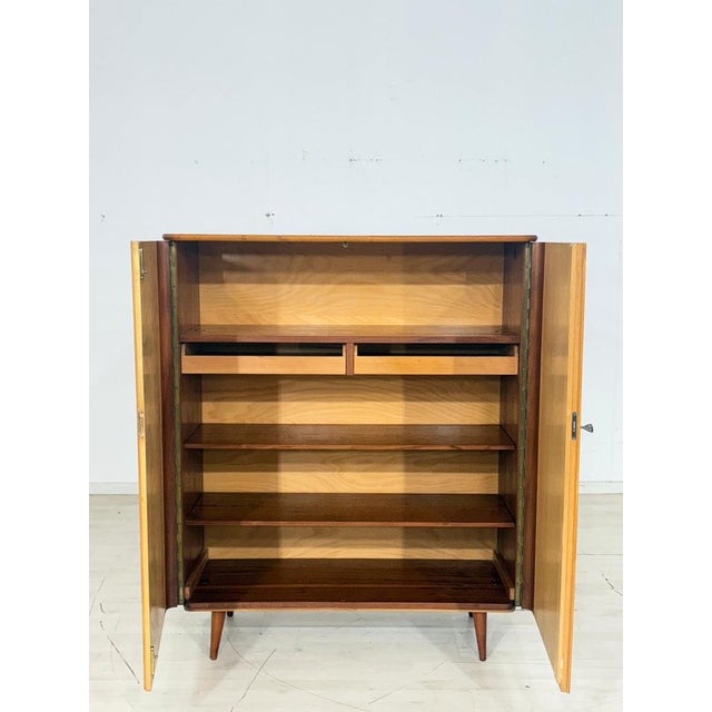 For sale is a beautiful vintage cabinet in very good condition. Wood: Birch/Makore, 1960s. Good condition. Key included....