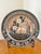 The largest we have seen, this monumental 20" Tonala earthenware charger features frolicking fawns among botanicals and...