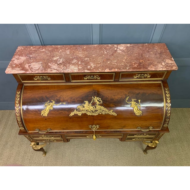 An exceptionally fine French Empire ormolu-mounted mahogany Cylinder-Bureau from the mid 19th century. Of generous...