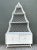 This vintage white rattan pagoda étagère combines airy open shelving with practical lower storage. Its tiered silhouette...