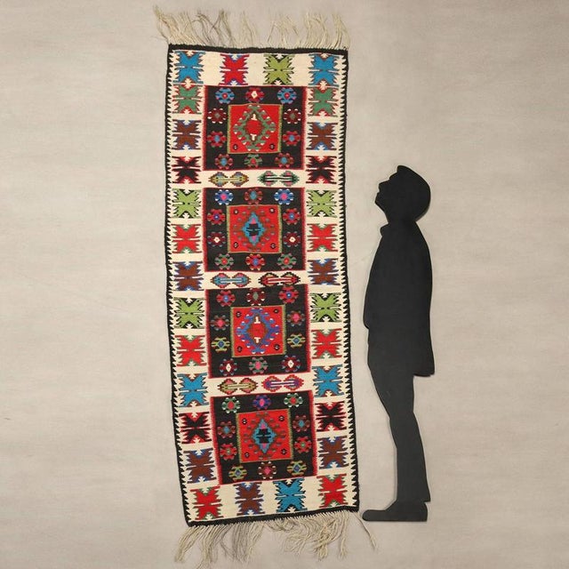 Kilim rug in wool, fine knot and hand made. This piece is attributed to the mentioned designer/maker. It has no...