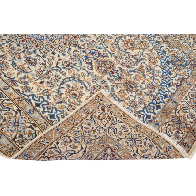Beautiful Persian Kashan hand-knotted wool rug with a beige field. This piece has a multicolor accents in an all-over...