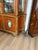 The 1960 Superb Quality Italian Display Cabinet is a beautifully crafted antique piece with intricate brass work and...