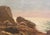 A late 19th century, American School seascape showing a lyrical view of sunlit waves flowing in towards a rocky beach. The...