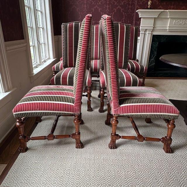 Edward Ferrell dining chairs exude old-world charm and classical beauty. The chairs feature tall backs that showcase a...