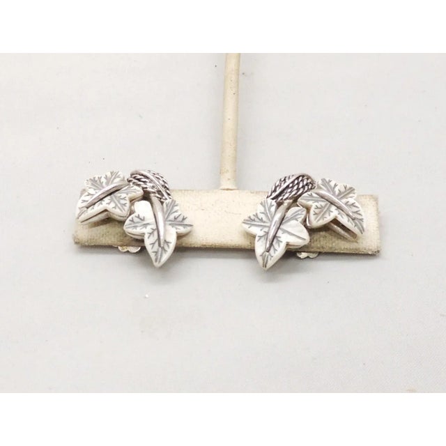 Boucher Vintage Signed Boucher Rhodium Plated White Thermoset Leaves Clip Earrings - 2 Pieces For Sale - Image 4 of 9