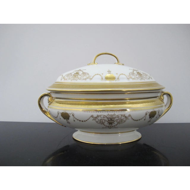 Stunning Minton, Burley & Co, porcelain tureen with lid. Cream tone porcelain with gold encrusted garland design. Measures...