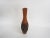 Wooden carved vase with tree bark. Wabi Sabi style.