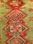 This vintage Turkish Oushak area rug showcases a rare and captivating color palette with a mellow abrash green and yellow...