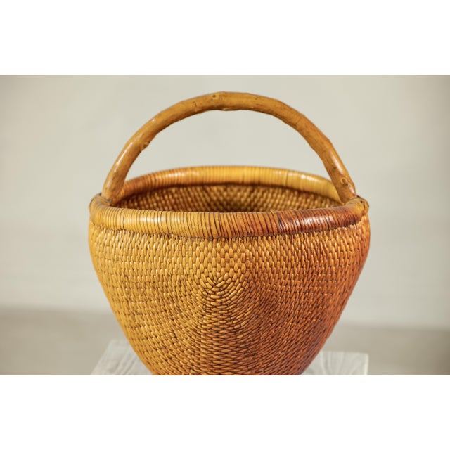 Rustic Vintage Chinese Handwoven Rattan Carrying Basket with Arched Handle For Sale - Image 3 of 18