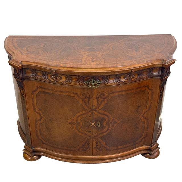 An impressive cabinet dating from the 1920s, designed in the Gerstel-inspired Neo-Baroque style associated with high-...