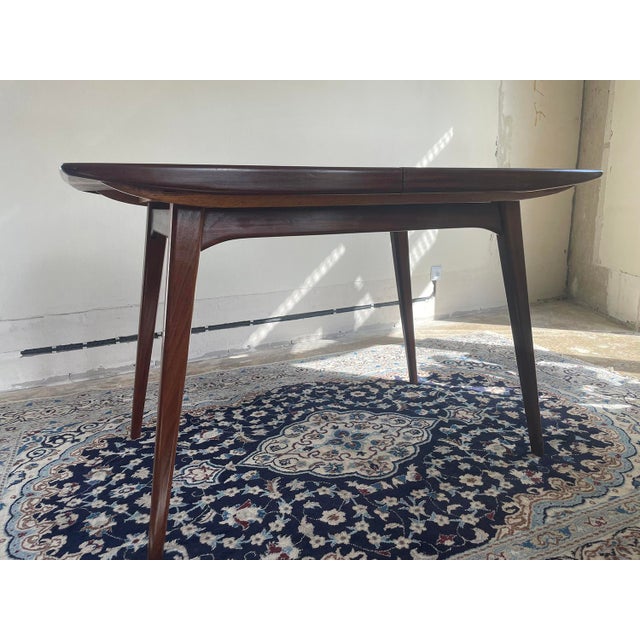 Milan Extendable Dining Table attributed to Louis Van Teeffelen for Wébé, 1960s, in Flawless conditions. Designed 1960 to...