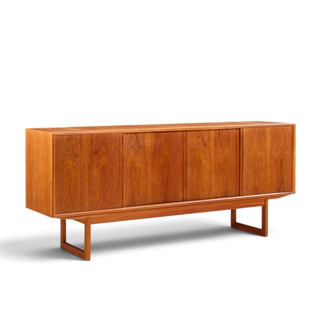 Kurt Østervig Style Mid Century Danish Teak Sliding Door Credenza and Hutch The credenza measures: 79 wide x 18.25 deep x...
