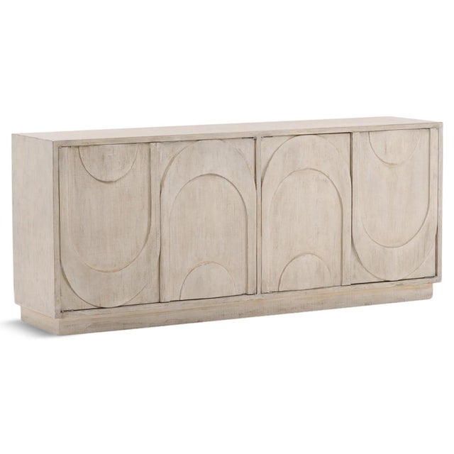 Reclaimed pine wood sideboard finished in a soft, light weathered wash. This four-door credenza brings warmth, texture,...