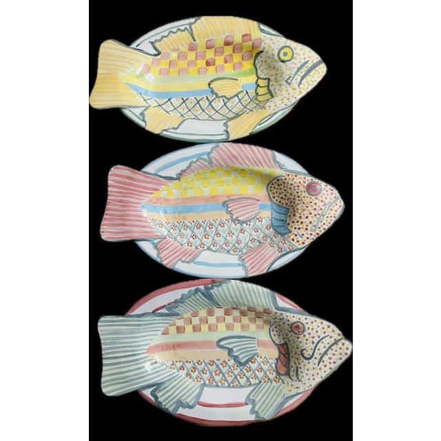 Vintage Mackenzie Childs a beautiful collection of fish platters hand painted all different pastel colors, pink, green,...