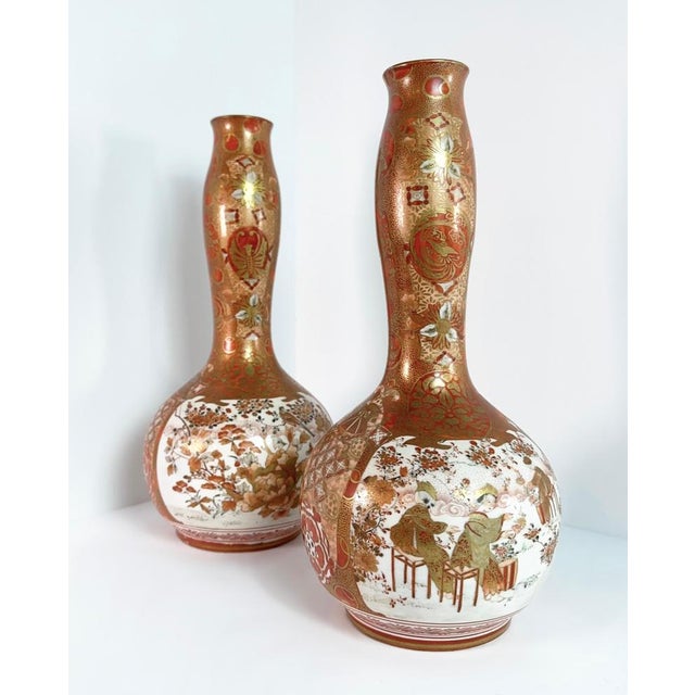 A matching pair of Meiji-period Japanese gourd-shaped vases, handcrafted in Kutani toward the end of the 19th century....