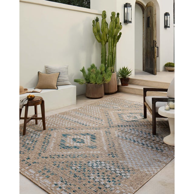 Inspired by the scenic mountain town in California, the Topanga Collection is an indoor/outdoor rug made of durable...
