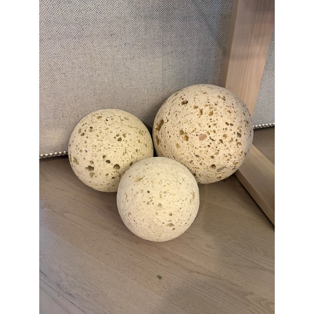 Michael Taylor fossilized stone set of three-sphere graduated sized stone decorative objects in mint condition. Very cool...