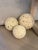 Michael Taylor fossilized stone set of three-sphere graduated sized stone decorative objects in mint condition. Very cool...