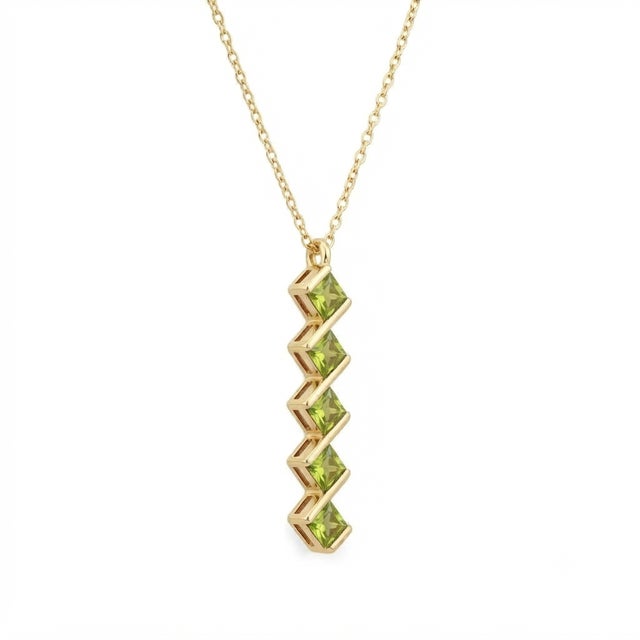 Sophisticated geometry meets fresh, vibrant elegance. Fall in love with this striking vertical bar pendant necklace....