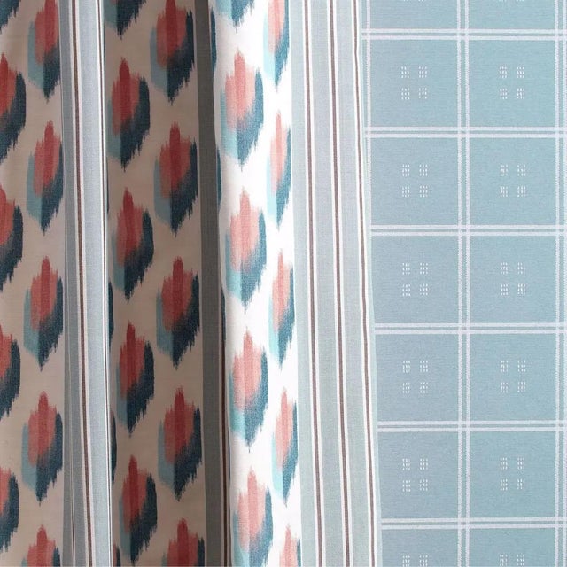 Meaning `traveller` Musafir inspired by an archive document is an ikat warp-printed mark alternating with a large stripe....