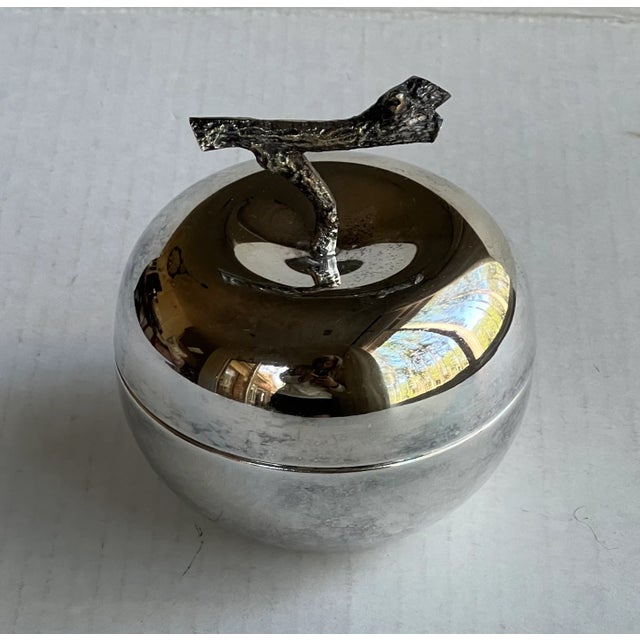 A beautiful and unique silver-plate apple bowl with glass insert. This could be used for candy, trays or even on your...