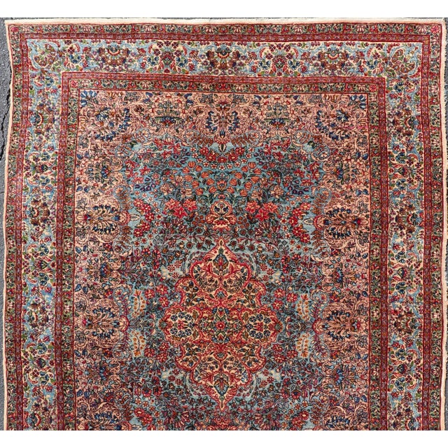 Measures: 5'10 x 8'6 Antique Kerman Rug With Soft Blue Field, Rose Red Medallion and Floral Design 5'10 X 8'6. Keivan...