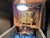 Vintage sculpted brutalist design grandfather clock made from resin and wood. The clock is illuminated on the inside and...