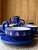 A distinctive vintage ceramic coffee set by HOY, characterized by its expressive sculptural forms and deep cobalt blue...