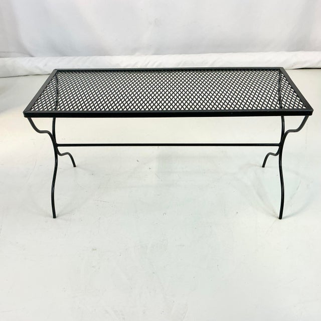 A perfect little Coffee Table for your outdoor space. The Mid-Century crafted metal table is in the manner of Italian...