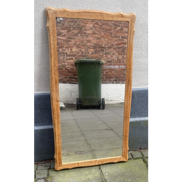 Large, Curvy and sculptural Wall mounted Oak mirror with solid frame. It was made by Stilo Møbler in Denmark during the...