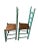 A Pair of Primitive Ladderback Chairs featuring woven seats and beautifully aged Turquoise.. Sturdy, in very good condition.