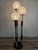Elegant 1970s floor lamp with wooden and steel structure and three Swirl spiral effect Murano glass light points. Note the...