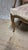An elegant louis xv armchair dating from the 1740s, featuring a gracefully curved carved wooden frame, shaped backrest,...