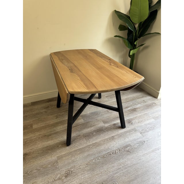 Beautiful ercol drop leaf table, this is made of pine which is unusual for ercol furniture it is no. 663. the top has been...
