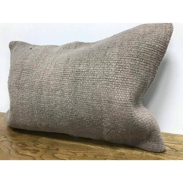 This is a vintage Turkish Anatolian kilim rug from the 1s. The piece was hand-woven. Just cover no insert