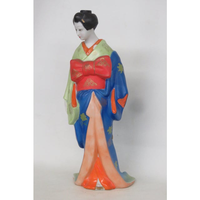 This beautiful Empty Decanter / Figurine is made of porcelain. This amazing decorative piece of novelty barware is marked...